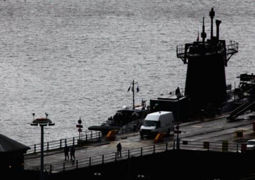 A trident submarine sits in dock at Faslane Naval base. Keith Brown admitted Scotland's Nato membership would not be 'automatic'. Picture: Getty