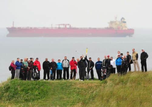Colin Montgomerie tees off at the 13th during his round at Gullane. Picture: Ian Rutherford