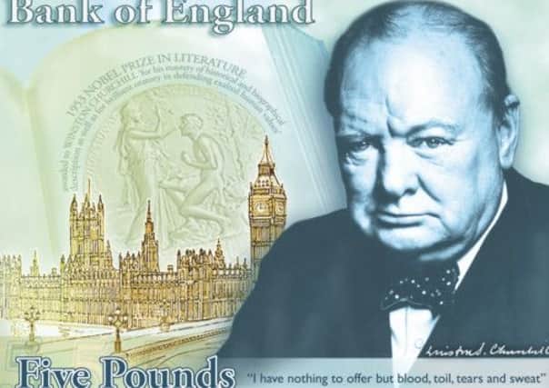 Winston Churchill was chosen over Elizabeth Fry to appear on new £5 banknote. Picture: AP

)