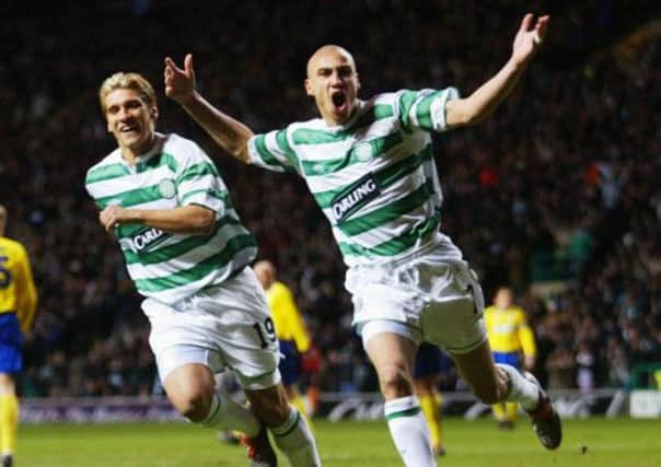 Henrik Larsson, right, celebrates a goal with team-mate Stiliyan Petrov in 2004. Picture: Getty