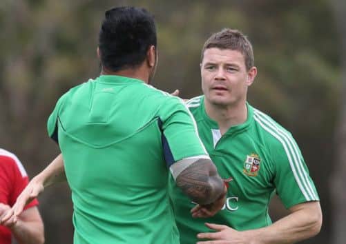 Brian O'Driscoll with team mate Manu Tuilagi. Picture: Getty