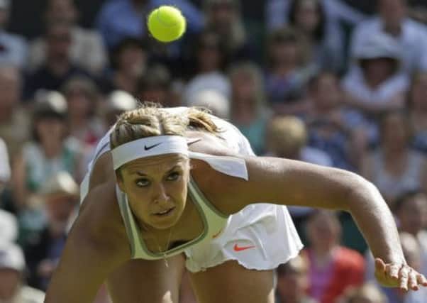 Sabine Lisicki eyes the ball during her semifinal against Agnieszka Radwanska. Picture: AP