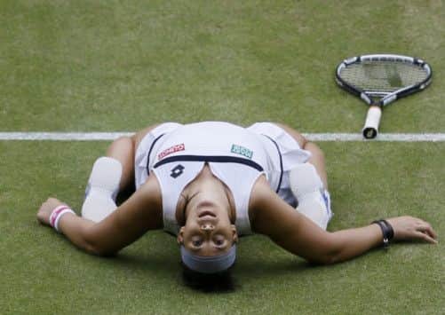 Marion Bartoli of France celebrates reaching her second Wimbledon final. Picture: Reuters