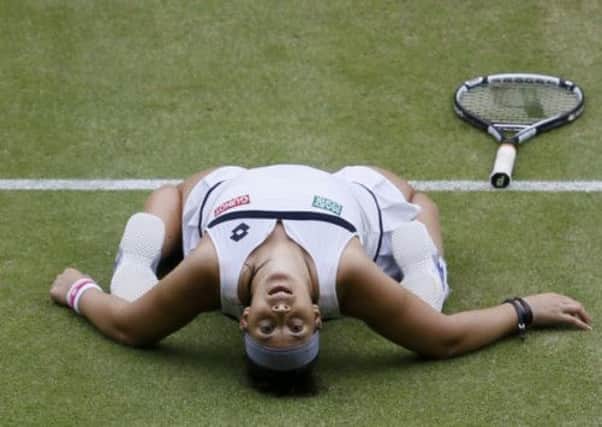 Marion Bartoli of France celebrates reaching her second Wimbledon final. Picture: Reuters