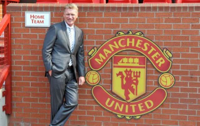 David Moyes poses at Old Trafford yesterday, as the new manager of Manchester United holds court. Picture: PA