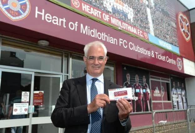 Alastair Darling with his Hearts season ticket at Tynecastle. Picture: Neil Hanna