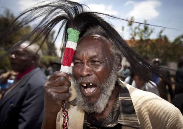 Mau Mau veteran Lawrence Mathenge and his comrades were urged to use their money wisely. Picture: AP