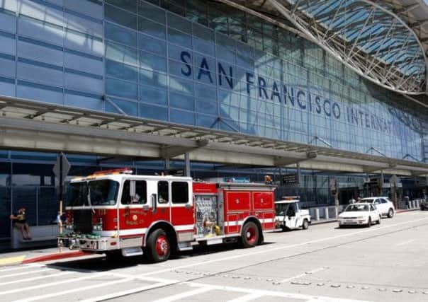 A fire truck stands in front of the closed international terminal at San Francisco International Airport. Picture: Getty