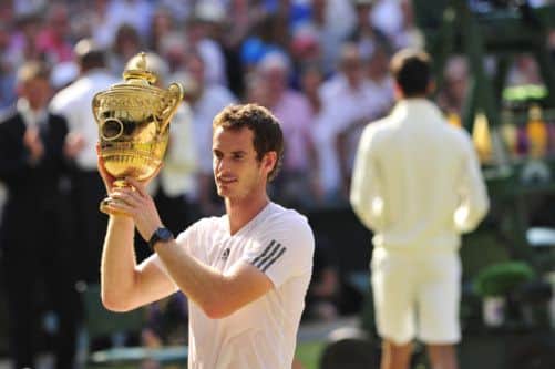 Andy Murray gets his hands on the trophy. Picture: Getty