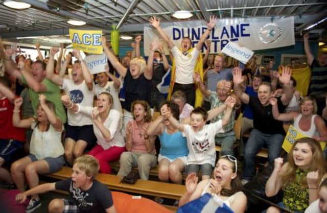 Murray mania reaches its peak in the Dunblane Centre, where Andys home-town fans packed in to watch their hero. Picture: Joey Kelly