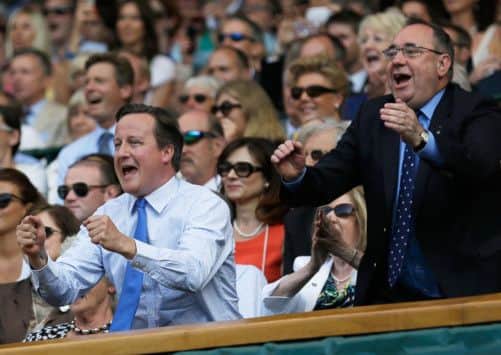 David Cameron and Alex Salmond celebrate at Centre Court. Picture: Getty