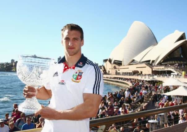 Tour captan Sam Warburton poses with the Tom Richards Cup at the Sydney Opera House. Picture: Getty