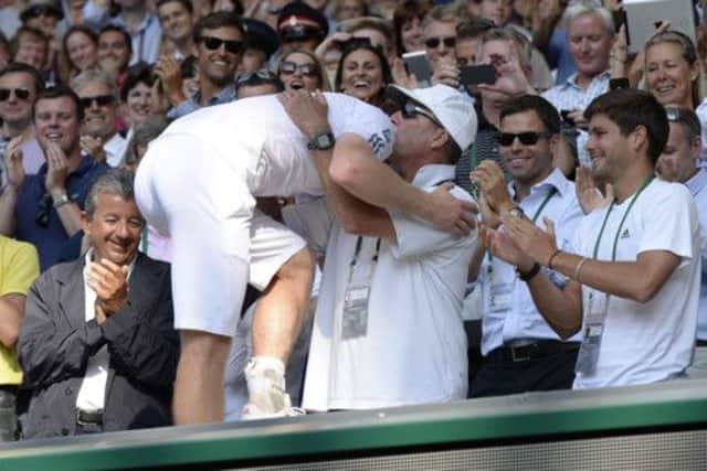 Andy Murray embraces coach Ivan Lendl after his victory yesterday. Picture: Getty