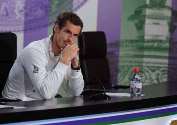 Andy Murray faces the media after his momentous victory at Wimbledon yesterday. Picture: AP