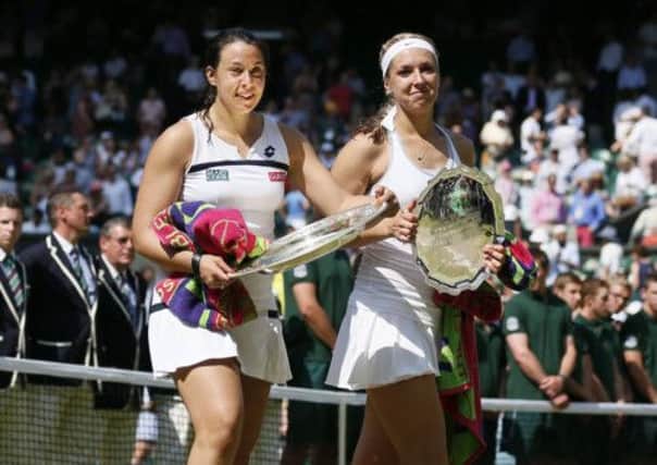 Champion Marion Bartoli (L) with runner up Sabine Lisicki. Picture: Getty