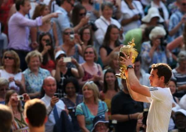 Retailers will enjoy a lift from Andy Murrays Wimbledon win, with the imminent royal birth also set to drive sales. Picture: Getty