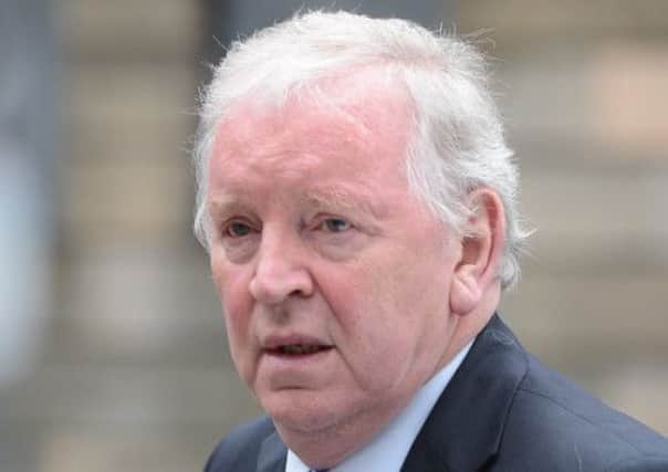 Bill Walker MSP arrives at Edinburgh Sheriff Court for his trial yesterday. Picture: Neil Hanna