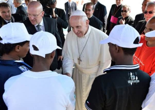 Pope Francis met immigrants at the pier on his visit to Lampedusa. Picture: Tullio M Puglia/Getty Images