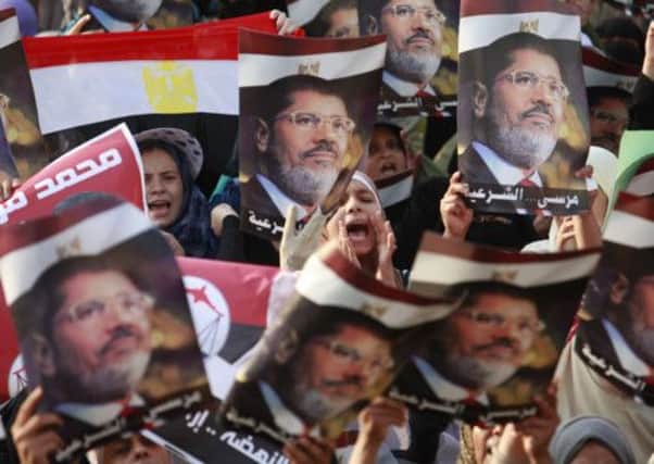 Supporters of ousted Egyptian president Mohammed Morsi demonstrate in Cairo. Picture: AP