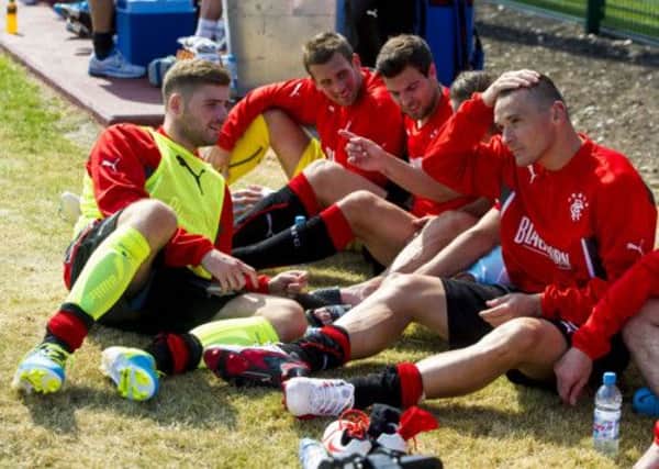 Lee McCulloch, right, and his Rangers team-mates have been enjoying their pre-season trip to the Highlands. Picture: SNS