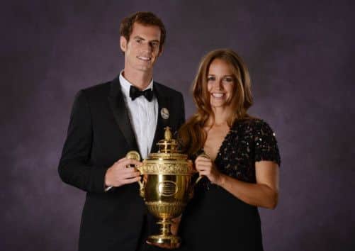 Andy Murray and girlfriend Kim Sears with the trophy. Picture: Getty