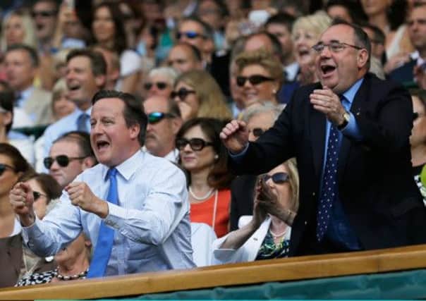 David Cameron and Alex Salmond at Wimbledon cheering on Andy Murray. Picture: Getty