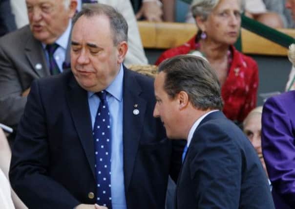 Alex Salmond and David Cameron could face each other in a live debate. Picture: AP