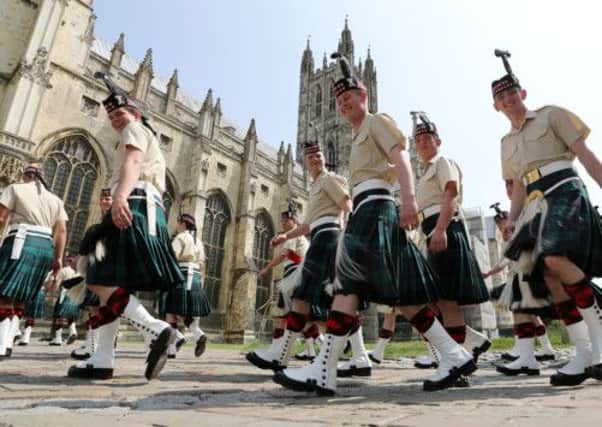 Soldiers from The Argyll and Sutherland Highlanders, 5th Battalion of the Royal Regiment of Scotland (5Scots) head into Canterbury Cathedral for a farewell service. Picture: PA