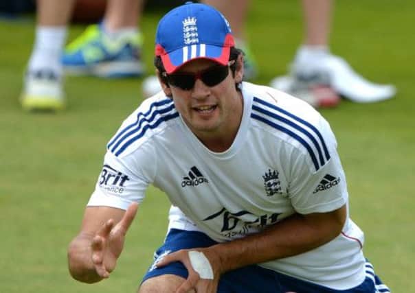 England skipper Alastair Cook gets in some fielding practice at Trent Bridge yesterday. Picture: Getty