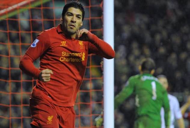 Luis Suarez has told Uruguayan media he is flattered by interest from clubs like Arsenal. Picture: Getty Images