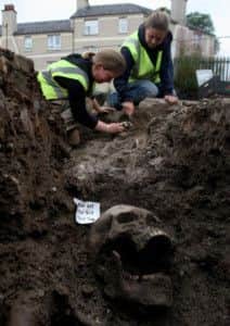 The archaeological Dig at the Corner of Whitefriars and Riggs Road in Perth where archaeologists continue their excavations of the Church ruins. Pictured from  the left, Claire Casey  Caroline George. A flooring company is demanding over £1million in compensation after they were prevented from building on their land after the discovery of an ancient burial ground. The site, which lies in the centre of Perth, was bought by Direct Flooring bought in 2006, but First Scottish Property Services Ltd (FSPSL) who sold the land, did not tell them about future archaeological digs set to take place. The excavations unearthed 103 skeletons and a 15th century friary but Direct Flooring had no choice but to to abandon the project after finding themselves out of pocket. See Northscot story 'FLOORED DIG'. 10/07/2013