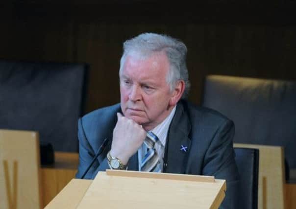 Bill Walker MSP, pictured in parliament in April of last year, is currently on trial over assault charges. Picture: Ian Rutherford