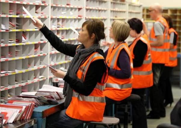 Royal Mail staff are to be offered up to ten per cent of shares in the company under plans unveiled by Vince Cable. Picture: PA