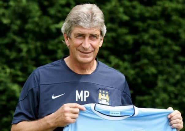 Manuel Pellegrini at his first Manchester City press conference. Picture: Getty