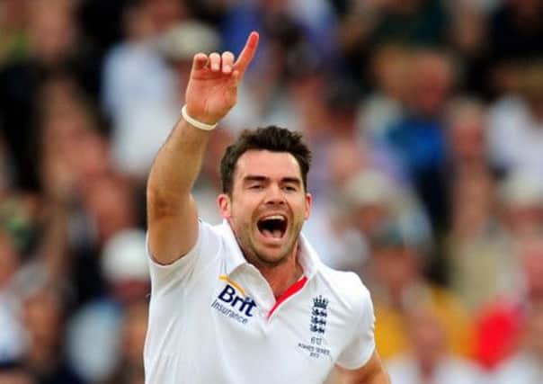 England's James Anderson celebrates after bowling Australia's Michael Clarke for a duck. Picture: PA