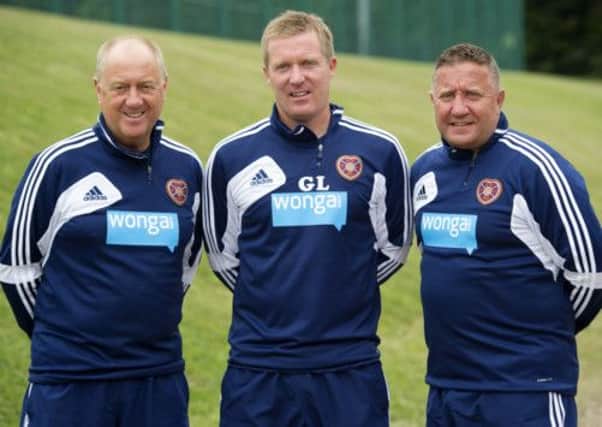 Hearts manager Gary Locke with pro-bono coaching team Billy Brown (L) and John Robertson (R). Picture: SNS