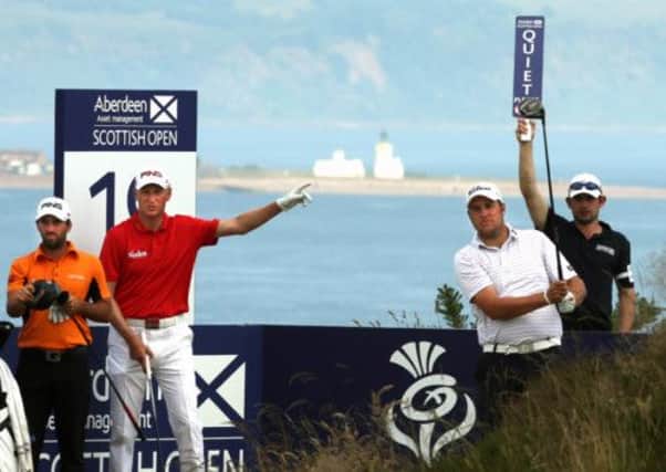 John Parry (left), Simon Wakefield and Matthew Southgate on the 18th. Picture: PA