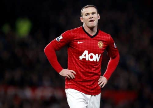 Rooney is flying home from Manchester United's tour of the Far East due to a hamstring injury. Picture: PA