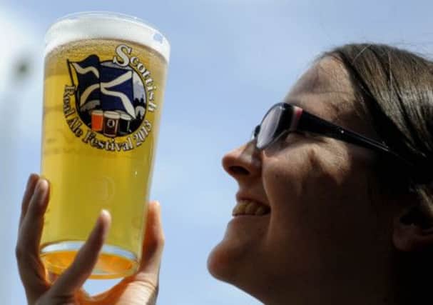 Alice Waltham enjoys a pint at the Scottish Real Ale Festival in Edinburgh. Picture: Esme Allen