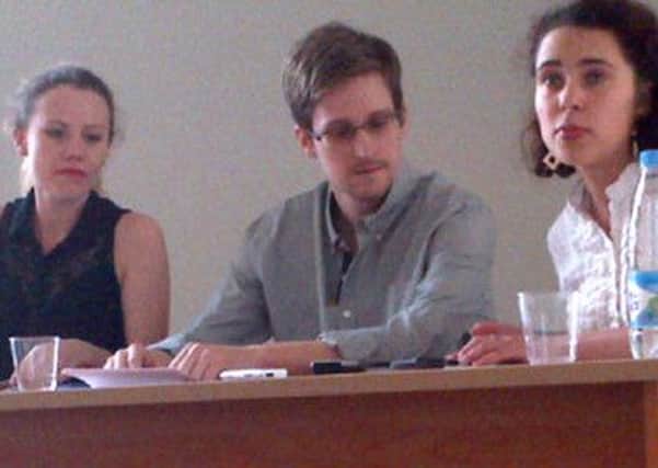 Edward Snowden with activists from WikiLeaks and Human Rights Watch. Picture: Getty/ Human Rights Watch