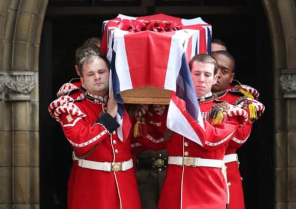 The coffin of Fusilier Lee Rigby leaves Bury Parish Church after his military funeral. Picture: Getty
