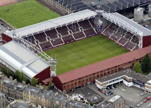 The Hearts squad are growing into their roles at Tynecastle, according to Tapping. Picture: SNS