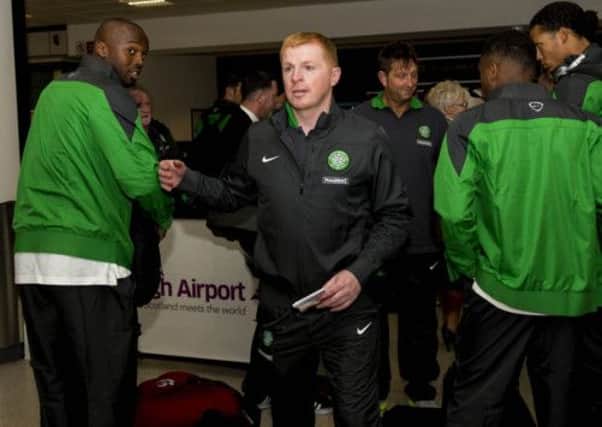 Celtic manager Neil Lennon, pictured with his team ahead of his side's pre-season trip to Germany. Picture: SNS