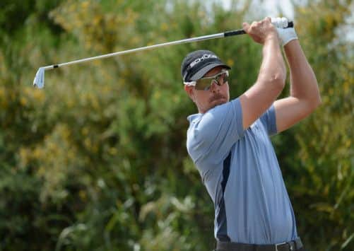 Henrik Stenson of Sweden tees off on the 9th. Picture: Getty