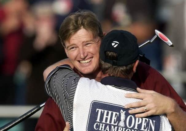 Els and his caddy celebrate as the South African wins the 2002 Open at Muirfield. Picture: Ian Rutherford