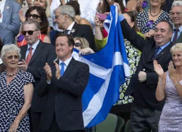 Alex Salmond takes the spotlight away from Andy Murray. Picture: SNS