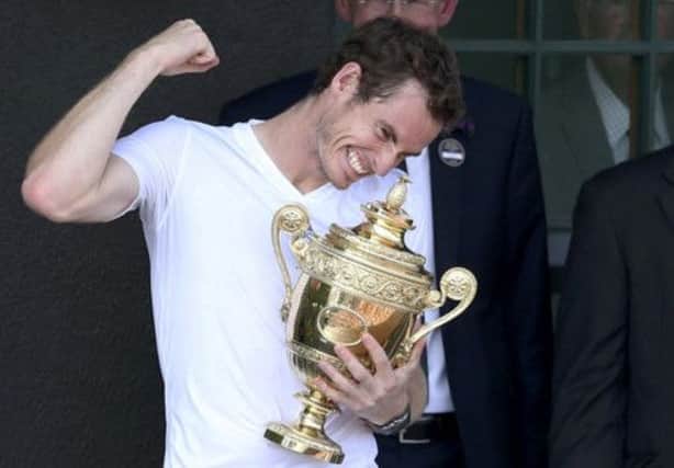 The Wimbledon trophy firmly in his grasp, Andy Murray can now aim for new targets. Picture: Reuters