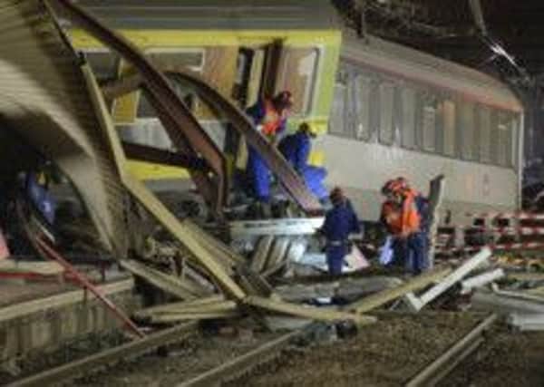 Wreckage litters the station as rescue workers searched for survivors. Picture: AFP/Getty