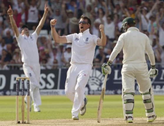Graeme Swann celebrates after taking the wicket of Australias Steve Smith. Picture: AP