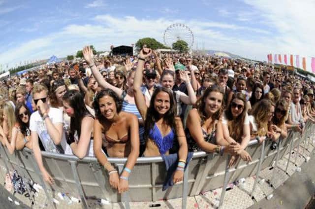 T in the Park fans bask in the Balado sunshine at the Main Stage. Picture: Greg Macvean